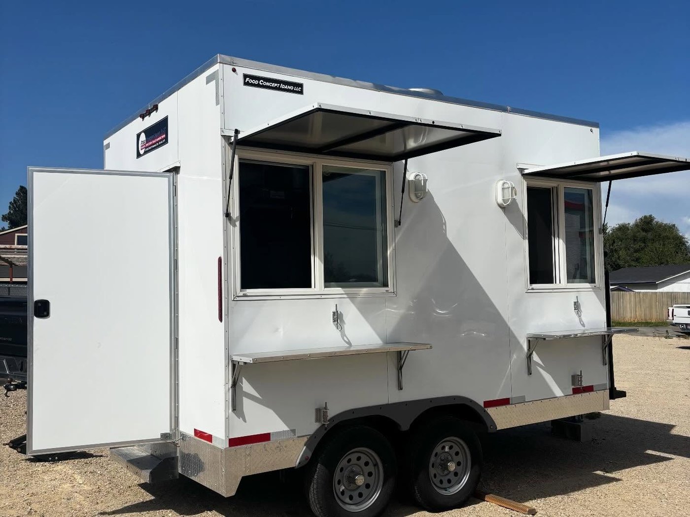 The Timberlakes white food trailer parked in daylight